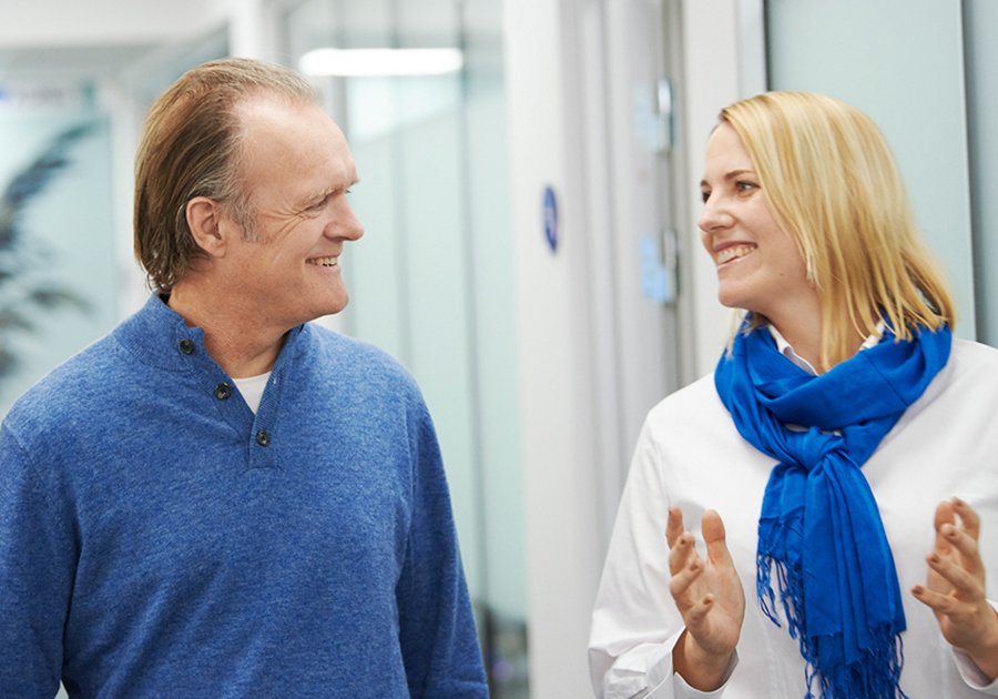 man and woman talking