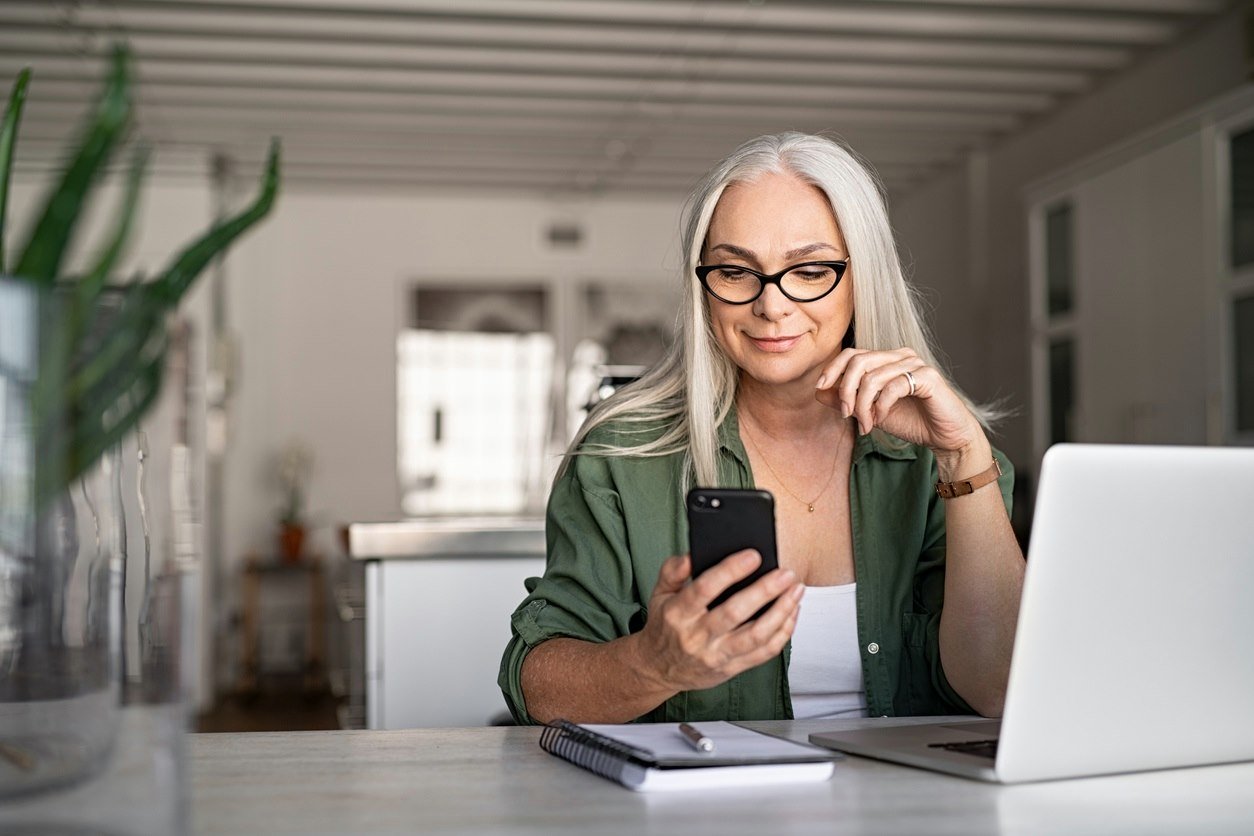 woman looking at phone