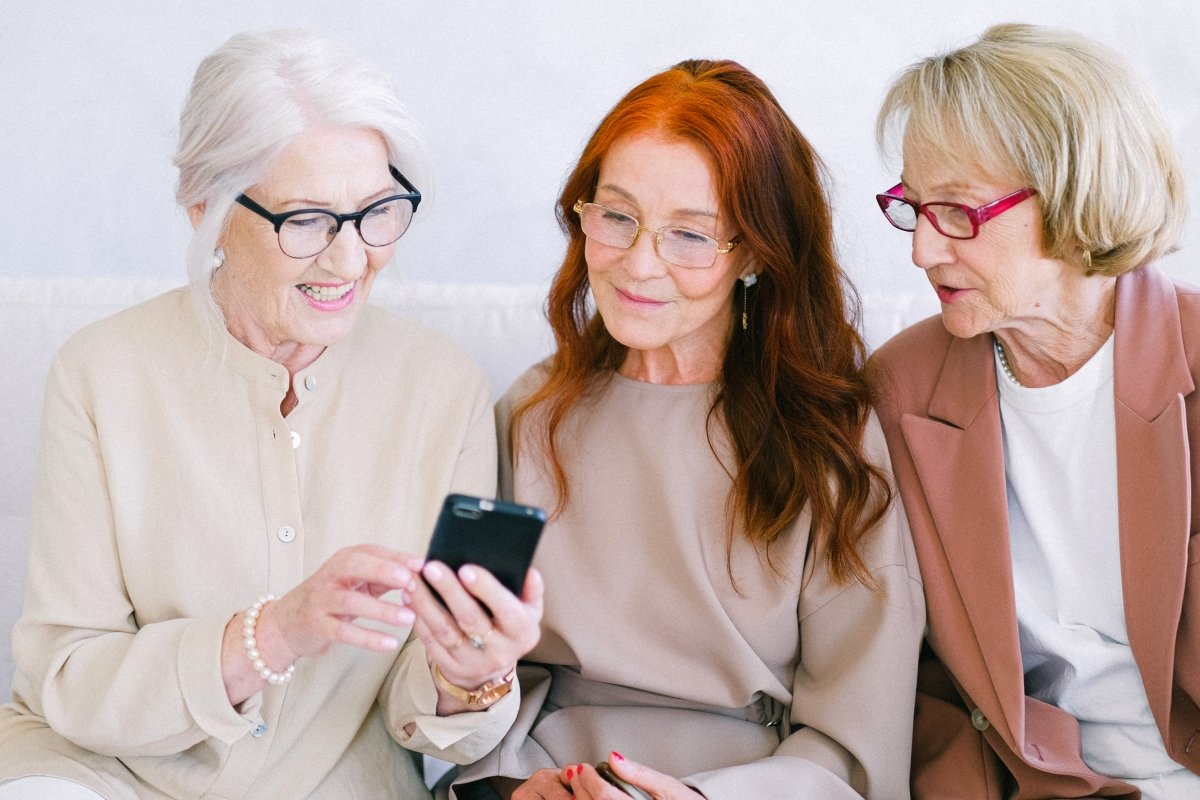 three senior women on phone video call