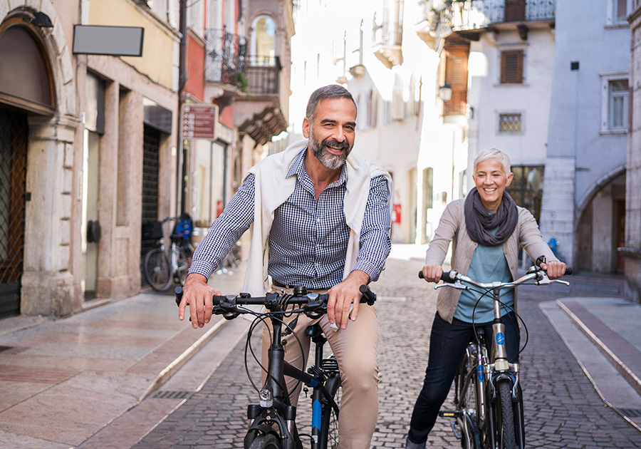 man and woman on a bicycle