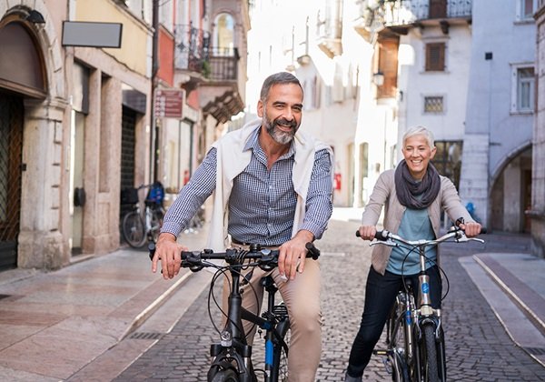 man and woman on a bicycle