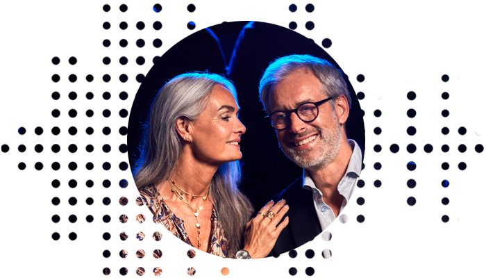 man and woman enjoying a show