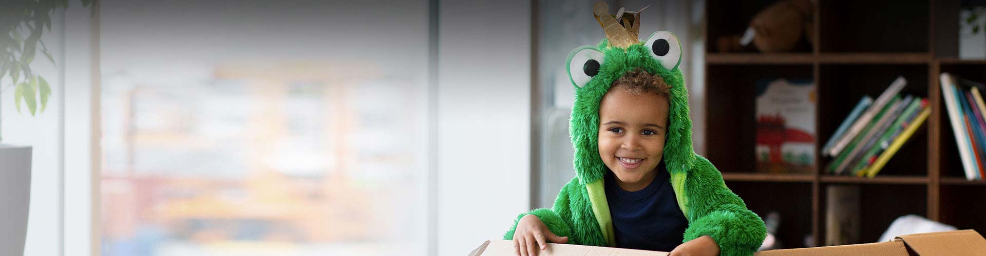 Child wearing Opn Play hearing aids in a costume